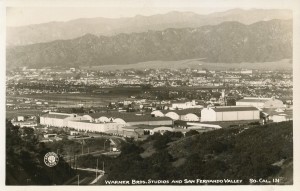 Aerial view of Warner Brothers Studios, Burbank, with the Valley spread out in the background. Black & white. 1930s or 40s?